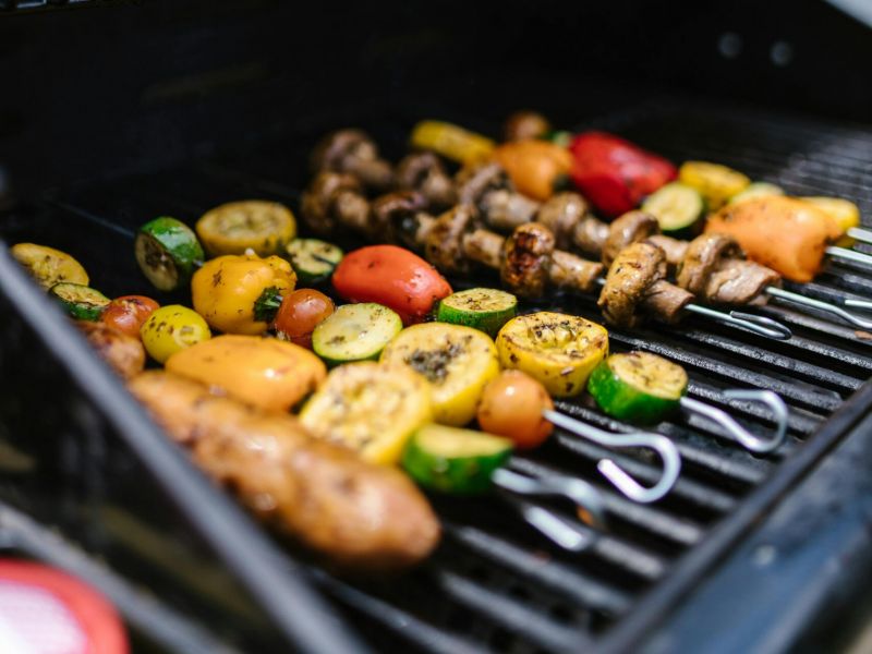 Grilling on outdoor BBQ with various vegetables 